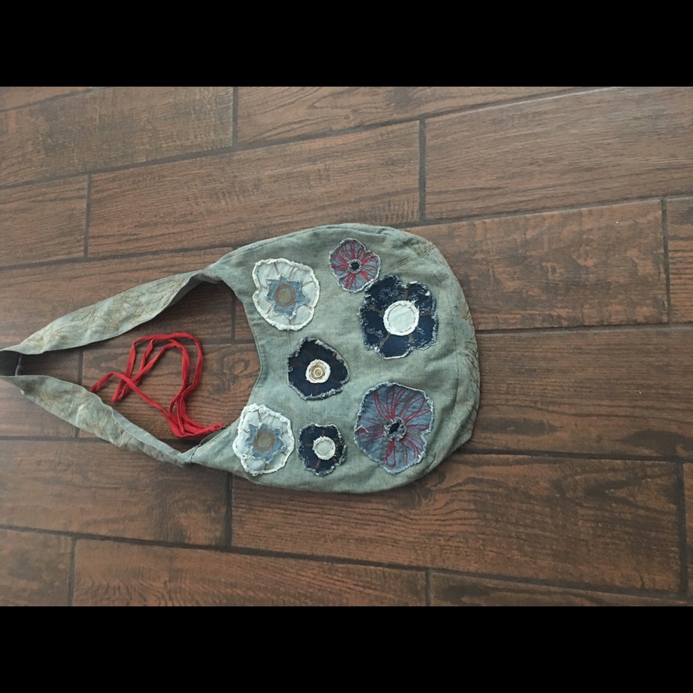 Very clean denim bag  with stress patches
